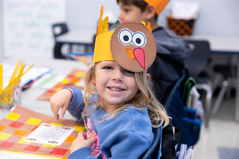 Creekside kindergartners and their families enjoy breakfast